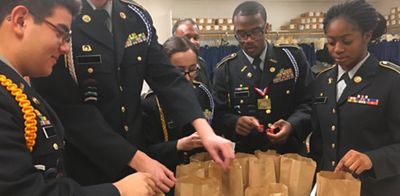 vets packing food for people