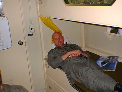 military member in bunk