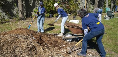 Navy Federal team does work on the front porch