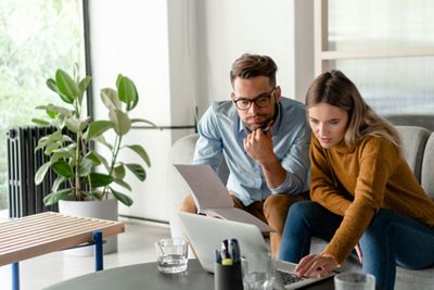 Two people working new idea