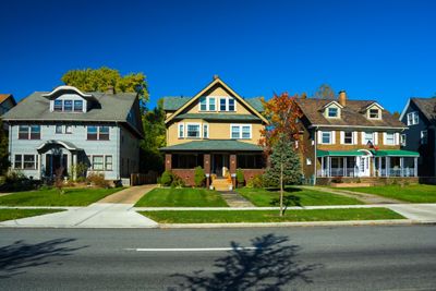 Three houses in a Cleveland, Ohio neighborhood.