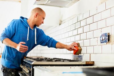 Man working in a new kitchen