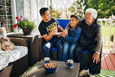 Three generations enjoying time on the patio